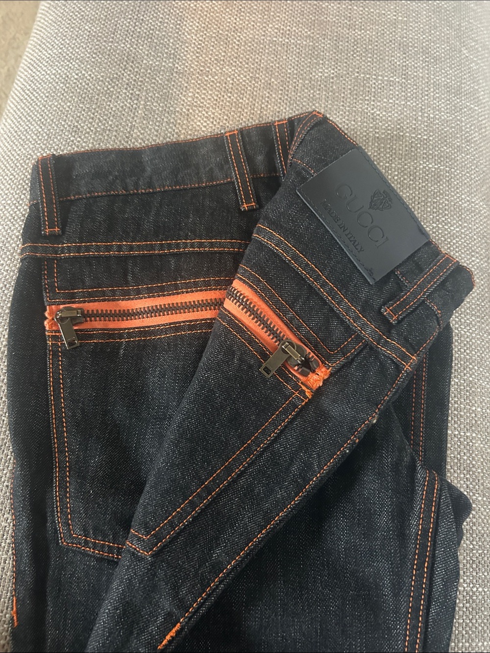 Gucci Slim Dark Denim Jeans with Orange Zipper Accents